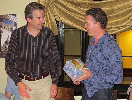 Simon Branch receiving a gift from Chairman Hywel Evans